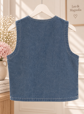 chaqueta de denim bordadoChaleco vaquero azul claro de mujer visto por detrás con diseño liso