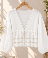 Blusa blanca con encaje Blusa blanca de gasa de algodón con encaje y manga abullonada