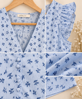 Blusa mujer azul claro Detalles de blusa de mujer azul claro con rayas, flores azules, volantes y botones