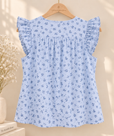 Blusa mujer azul claro Blusa de mujer azul claro con rayas y flores azules vista por detrás
