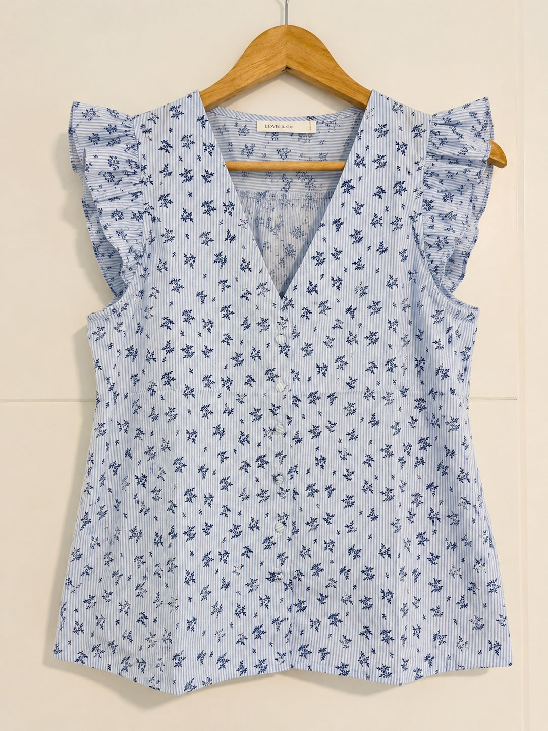 Blusa Floral con Volantes Azul